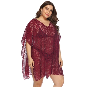 Detailed view of the intricate floral lace pattern on this oversized wine red V-neck cover-up