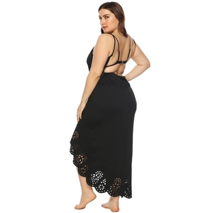 Plus size black backless maxi dress with laser-cut floral details and adjustable straps