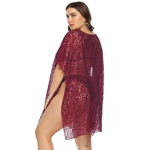Deep red lace bikini cover-up in loose plus size fit with floral hollow design