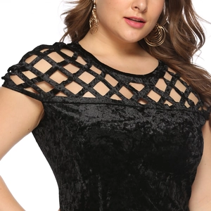 Close-up of the hollow lattice shoulder detail on this black velvet short sleeve dress