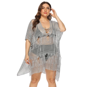 Women's plus size grey knit beach cover-up with hollow out design and lace-up detail