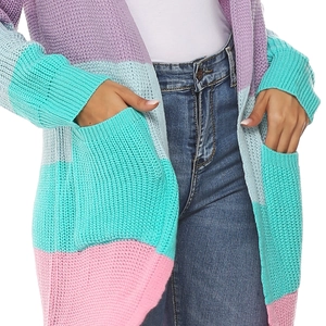 Detail of multi-color striped chunky knit cardigan with deep pockets and thick texture