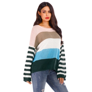 Detail of multi-color striped knitted sweater featuring soft texture and loose fit