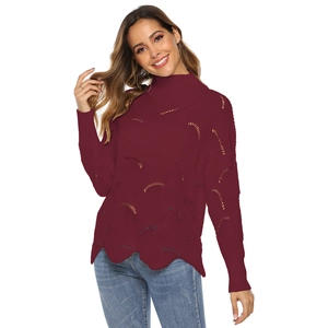 Women's burgundy knit sweater featuring pointelle cut-outs and a stylish wavy hemline