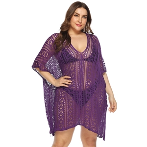 Detail of purple plus size crochet beach cover-up with V-neck and geometric mesh pattern
