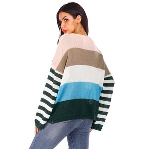 Women's oversized knit sweater with colorful stripes and drop shoulder design