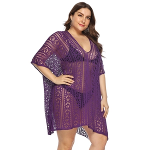 Detailed view of purple crochet beach cover-up featuring geometric hollow-out patterns