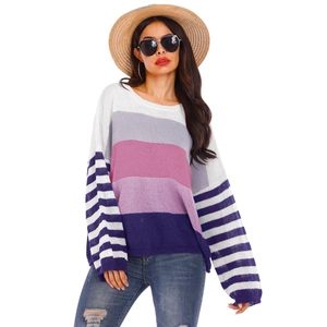 Women's loose striped knit sweater featuring a crew neck and colorful multi-tone stripes
