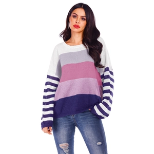 Detail shot of multi-color striped loose knit sweater showing texture and stitching
