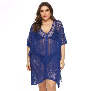 Close-up of dark blue crochet hollow knit texture on a plus size V-neck beach cover-up