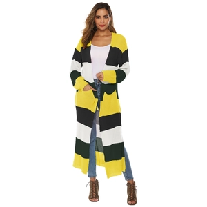 Close-up of color block striped knit cardigan featuring front pockets and rib cuffs