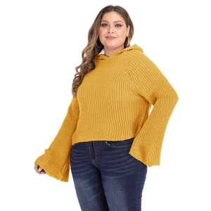 Detail of ginger yellow open knit hoodie featuring flare sleeves and drawstring hood