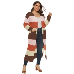 Detailed view of color-block striped long cardigan featuring large pockets and ribbed cuffs