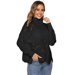 Women's black hollow knit sweater with turtleneck and relaxed drop shoulder design