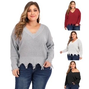 Women's plus size V-neck chunky knit sweater with distressed frayed hems in four colors