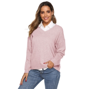 Pink V-neck knit sweater with drop shoulder design and white shirt layered look for women