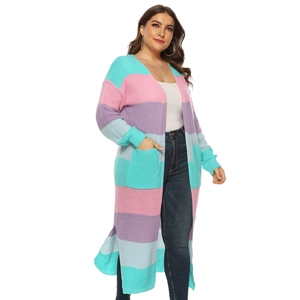 Detail shot of long knit cardigan featuring colorful stripes and large functional pockets