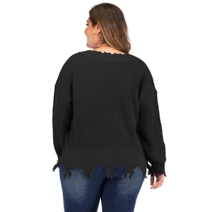 Black oversized V-neck knit sweater with distressed frayed edges and loose fit