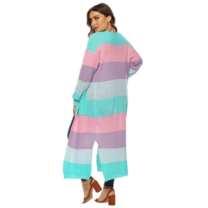 Detail shot of a long knit cardigan showing the side split design and multi-color stripes