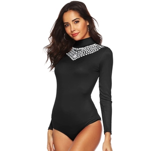 Women's slim fit black ribbed bodysuit with white lace high neck and long sleeves