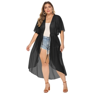 Detail of adjustable waist drawstring on long black chiffon beach cover-up cardigan
