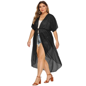 Detailed view of lightweight black chiffon plus size cover-up with tie-front and flowy sleeves