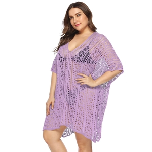 Detail showing the lavender crochet pattern and V-neckline of the beach cover-up