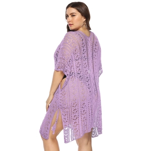 Detail view of purple crochet beach cover up with hollow knit and side slit design