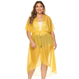 Detail of adjustable waist drawstring on lightweight lemon yellow chiffon beach cover-up