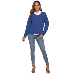 Full view of women's royal blue V-neck knit sweater with ribbing and casual loose fit