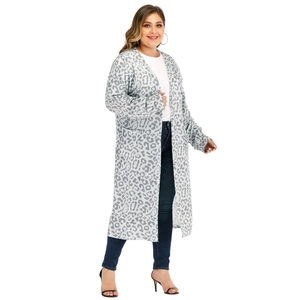 Close-up of leopard print knit cardigan with front pockets and relaxed silhouette