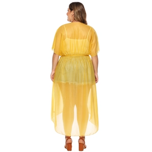 Back view of a long bright yellow chiffon cardigan with waist tie for beach sun protection