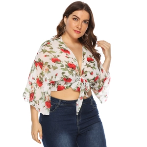 Detail of plus size floral chiffon cardigan with bell sleeves and front tie knot waist
