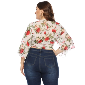 Plus size chiffon cardigan with rose floral print and bell sleeves shown from a back view