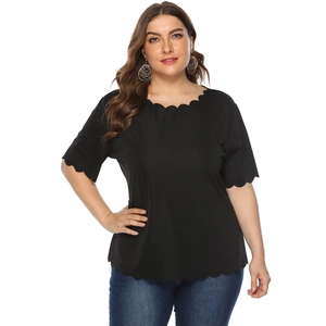 Detail of scalloped edges on black crew neck plus size t-shirt for women