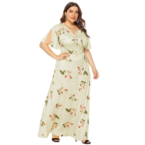 Detail of floral V-neck maxi dress with split ruffle sleeves and waist tie in sage green