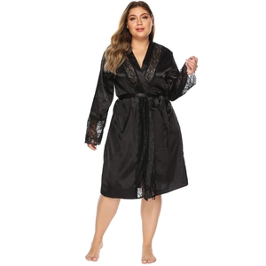 Detailed view of black satin robe featuring elegant eyelash lace trim and matching waist tie