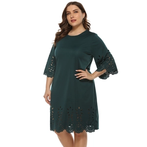 Plus size dark green A-line dress with laser cut floral patterns and half sleeves