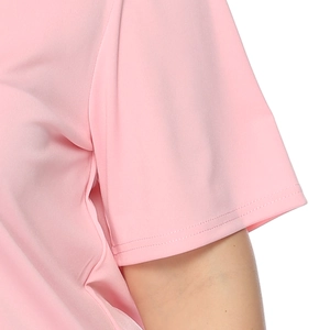 Detailed close-up of pink short sleeve cuff with reinforced double-stitch sewing finish