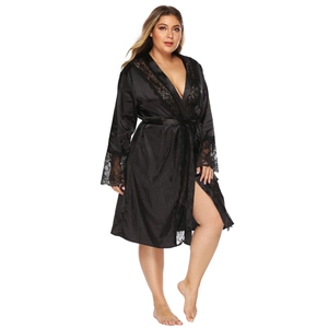 Detail of plus size black satin robe with eyelash lace trim on neckline and cuffs