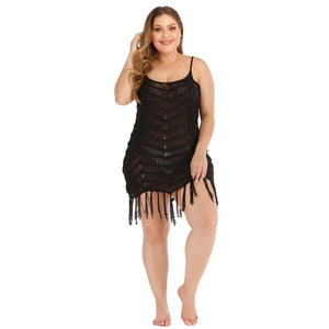 Plus size black crochet beach dress with fringe hem and hollow out knit design