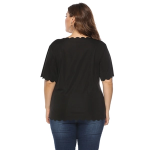 Plus size black T-shirt for women with wavy scallop edges and a stylish crew neck
