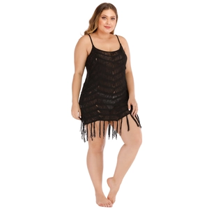 Plus size black crochet knit beach dress featuring hollow-out patterns and long fringe tassels