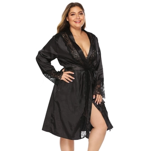 Detail of black lace embroidery on long sleeve cuffs and neckline of satin robe