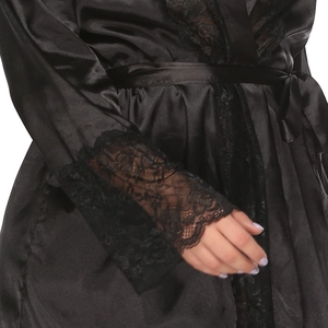 Detail shot of black satin robe featuring intricate lace trim on the sleeve cuffs