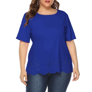 Detail view of royal blue plus size top featuring intricate hollow floral laser cut hemline