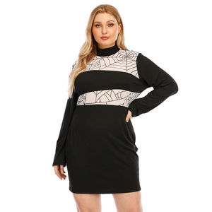 Detail of bodycon dress showing black fabric with spider web print white stripes