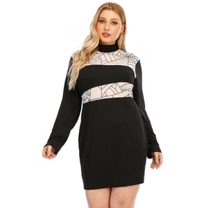 Plus size long sleeve mock neck dress in black with white spiderweb print panels