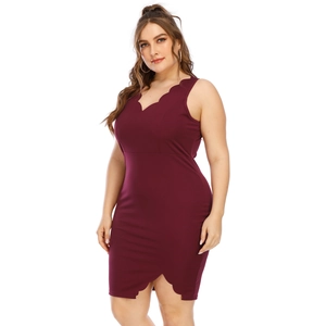 Detailed close-up of the scalloped hem on the slim fit sleeveless plus size burgundy dress