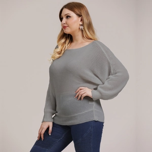 Detail of grey knit pullover top with round neck and baggy batwing sleeves style